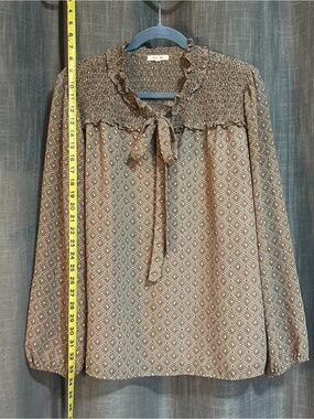Pleione Brown Geo Smocked Tie-Neck Blouse